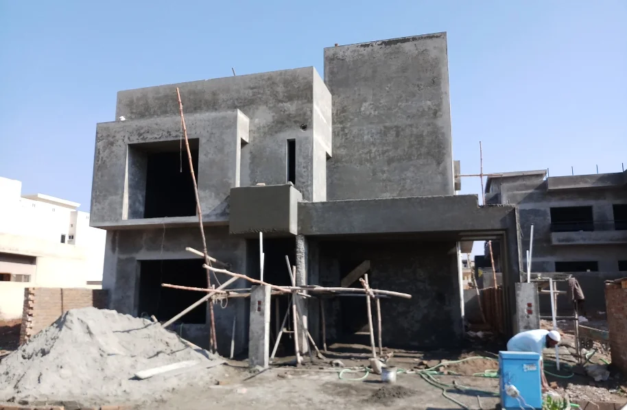 Front view of the house after the completion of gray structure